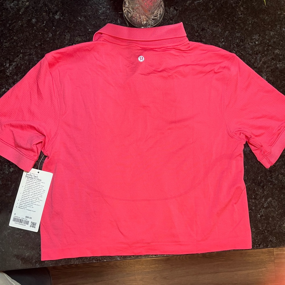 Lululemon brand new swiftly tech relaxed fit polo. Crop shirt. Still has tags!